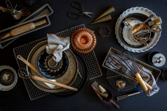 Baking and patisserie equipment over black background
