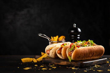 Three delicious hotdogs - 266367815