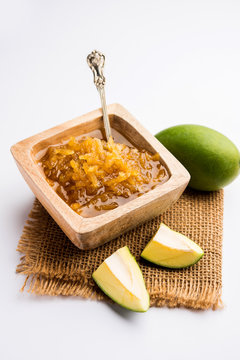 Mango Chunda or Sakhar Amba is a traditional indian summer recipe made using accha aam preserved in sugar syrup for days. selective focus