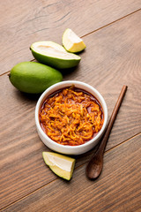Mango Chunda or Sakhar Amba is a traditional indian summer recipe made using accha aam preserved in sugar syrup for days. selective focus