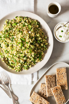 Cucumber tabouli salad with tzatziki dip and toast fingers.