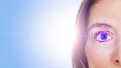 laser surgery concept close up of female eye with light flares