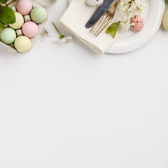 Easter composition on white backgrount, top view