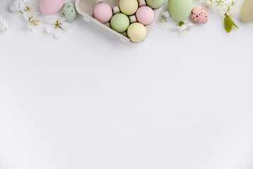 Easter composition on white backgrount, top view
