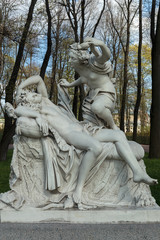 Sculptural composition of the Summer Garden " Cupid and Psyche". Copy. Old Public park "Summer Garden" in St. Petersburg, Russia