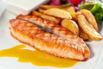grilled salmon steak with french fries
