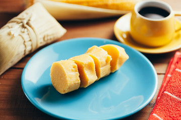 Typical food of Brazilian Festa Junina - June Festival. Pamonha and coffee