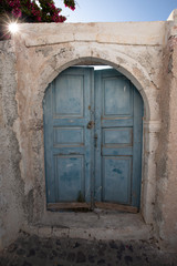 Blue painted door in Santorini