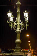 Fototapeta na wymiar large street lights on the bridge