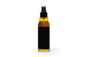 Glass bottle with Spray olive oil  and black blank label. Isolated on white background. Weight 100 ml