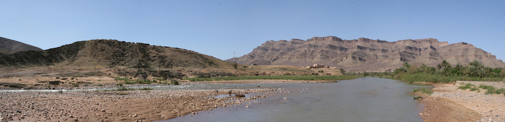 Panoramic photos of buildings and ancient historical places called alqasbat and oases and natural mountains in Morocco are located in the Ouarzazate region near the Moroccan Sahara