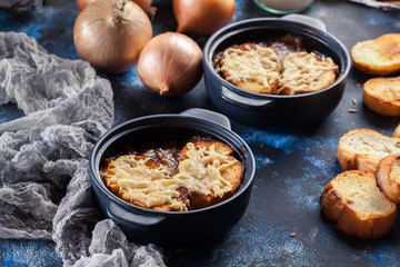 Delicious onion soup with croutons and cheese