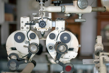 Old Optometry machine vision,Old Optometry machine vision,Eye sight vision test machine measurement,vintage style,soft focus.