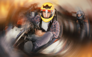 Fototapeta na wymiar Man driving go-kart car