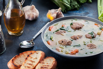 Italian wedding soup with meatballs and vegetables