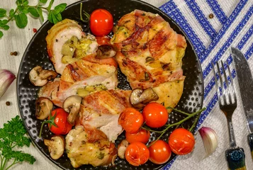 Deurstickers Juicy chicken breast rolls with artichoke filling and smoked ham © idejuguru