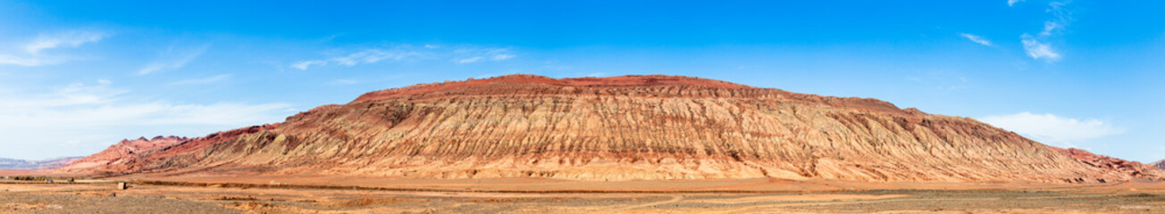 Flaming mountains, Turpan, Xinjiang, China: these intense red arid mountains similar to scorching flames appear in the Chinese epic “Journey to the west”. Turpan is an ancient oasis on the Silk Road
