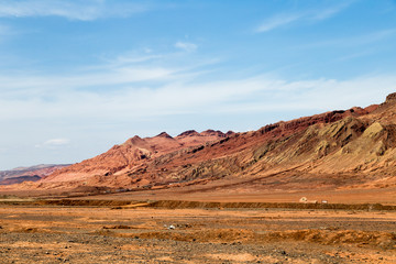 Flaming mountains, Turpan, Xinjiang, China: these intense red arid mountains similar to scorching flames appear in the Chinese epic “Journey to the west”. Turpan is an ancient oasis on the Silk Road
