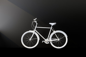 white bicycle with black wall