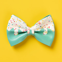 Cute hair bow on bright background, flat lay