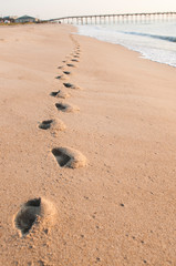 Fototapeta na wymiar Beach foot prints 3
