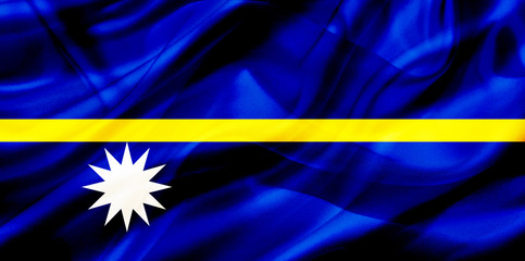 Nauru country flag on silk or silky waving texture