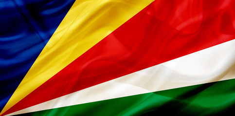 Obraz premium Seychelles country flag on silk or silky waving texture