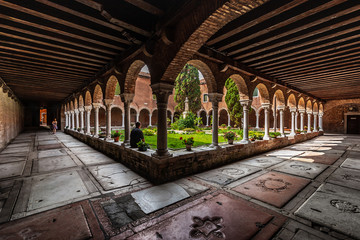 Courtyard of the Church of San Francesco della Vigna Venice with ancient cemetery, Venice, Italy.