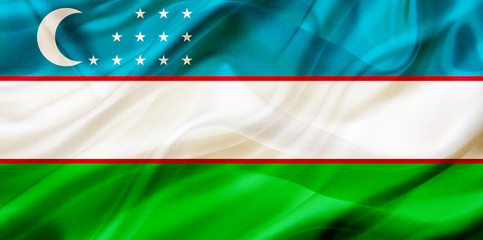Uzbekistan country flag on silk or silky waving texture