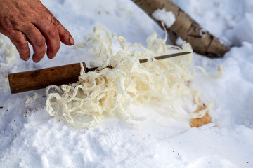small sawdust wood made by hand, for use instead of toilet paper by the peoples of the far north,