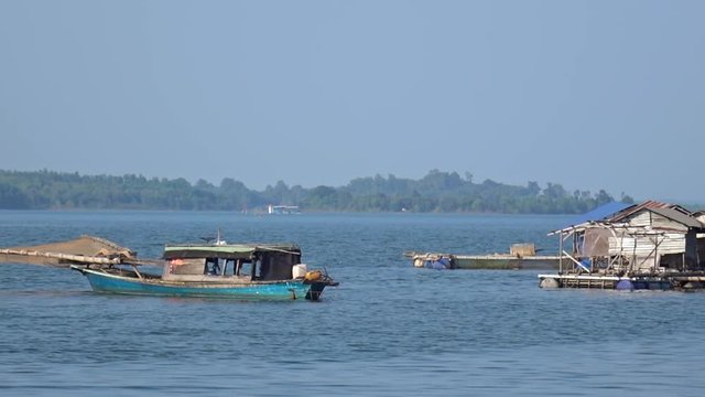 Floating boat house Tr An Lake. Vietnam. Panorama.