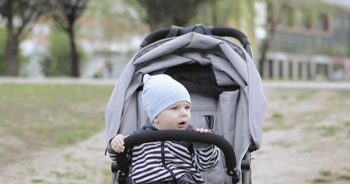 Baby boy in a stroller