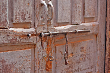 pictures of antique Morocan locks and wooden doors in medina marrakech