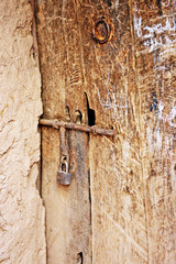 pictures of antique Morocan locks and wooden doors in medina marrakech