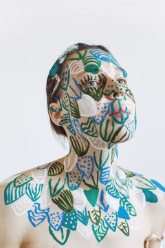 A portrait of a young woman with makeup