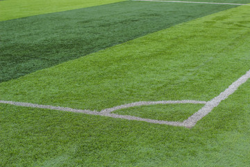 Obraz premium football stadium field cut green grass striped surface with white lines marking of corned place, sport game playground picture, copy space