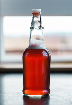 kombucha tea flavored with fruit juice on second ferment