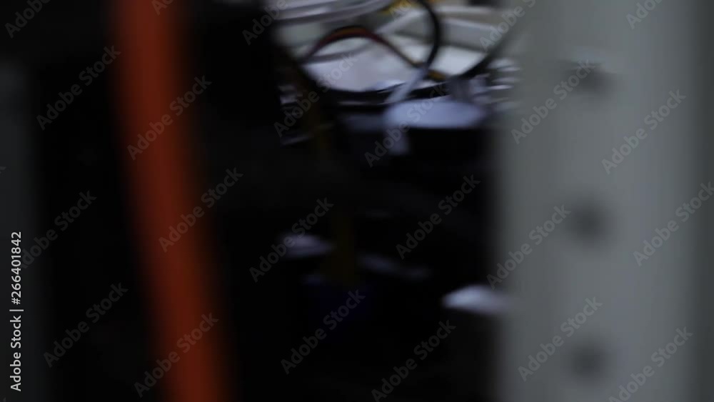 Poster bitcoin cryptocurrency mining farm with a close up view of the detail of a mechanism with blinking i