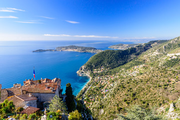 Scenic view of the Mediterranean coastline and medieval houses from the top of the town of Eze village on the French Riviera