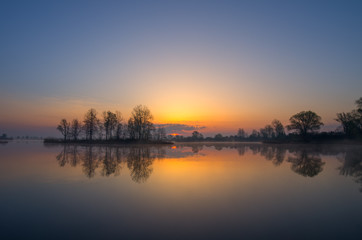 Plakat sunset on the lake