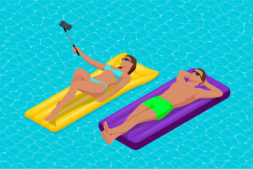 Inflatable ring and mattress. Young man nad woman on air mattress in the big swimming pool. Summer holiday idyllic. Enjoying suntan. Vacation concept. High view from above. - obrazy, fototapety, plakaty