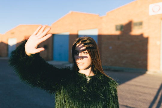 Abstract photos of hypster woman at industrial suburbia
