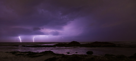 Thunderstorm on mediterranean sea beach