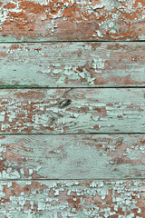 old wooden background with remnants of blue and brown . background texture of wood boards for design