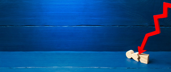 The red arrow cleaves the person. The concept of psychological pressure. Victim of the economic crisis, falling quotations and the collapse of the market. Vulnerable person, defeat. copy space banner