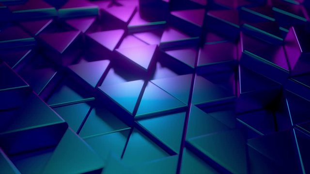 Abstract background of metal glossy triangles. Modern fashion lighting. Seamless loop 4k animation