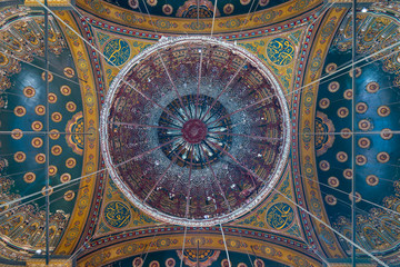 Ceiling of the great Mosque of Muhammad Ali Pasha (Alabaster Mosque) decorated with golden and blue floral patterns, situated in the Citadel of Cairo in Egypt