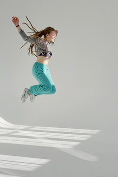 Cheerful girl jumping