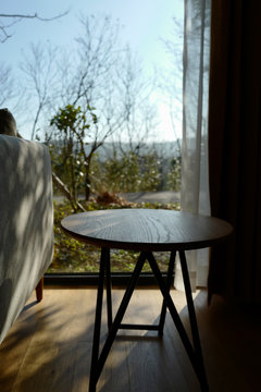 In the light of the wood coffee table at home