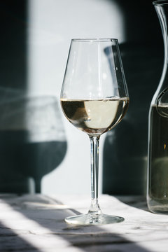 Sunlit glass of white wine